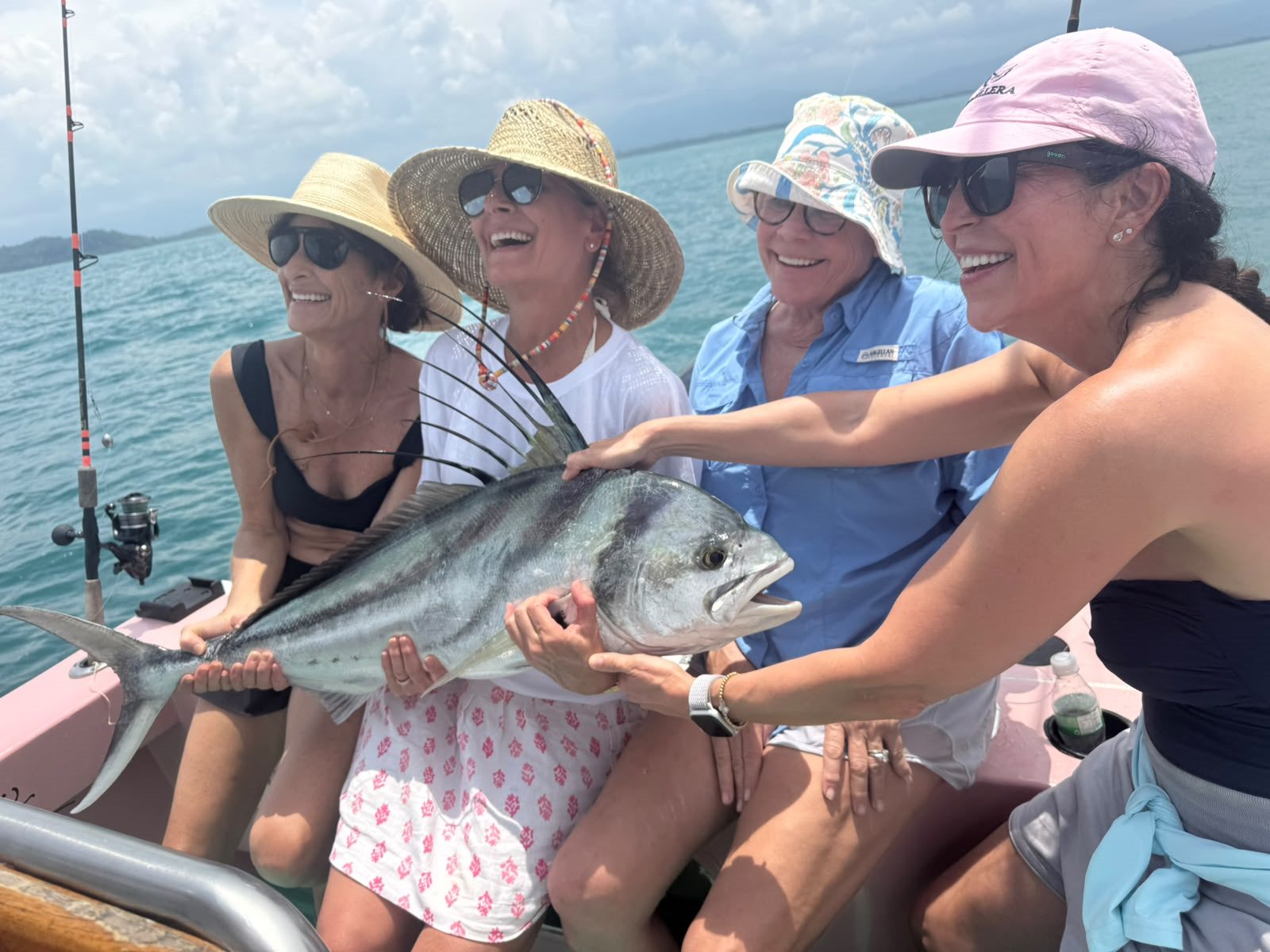 Group of women smiling together with their catch